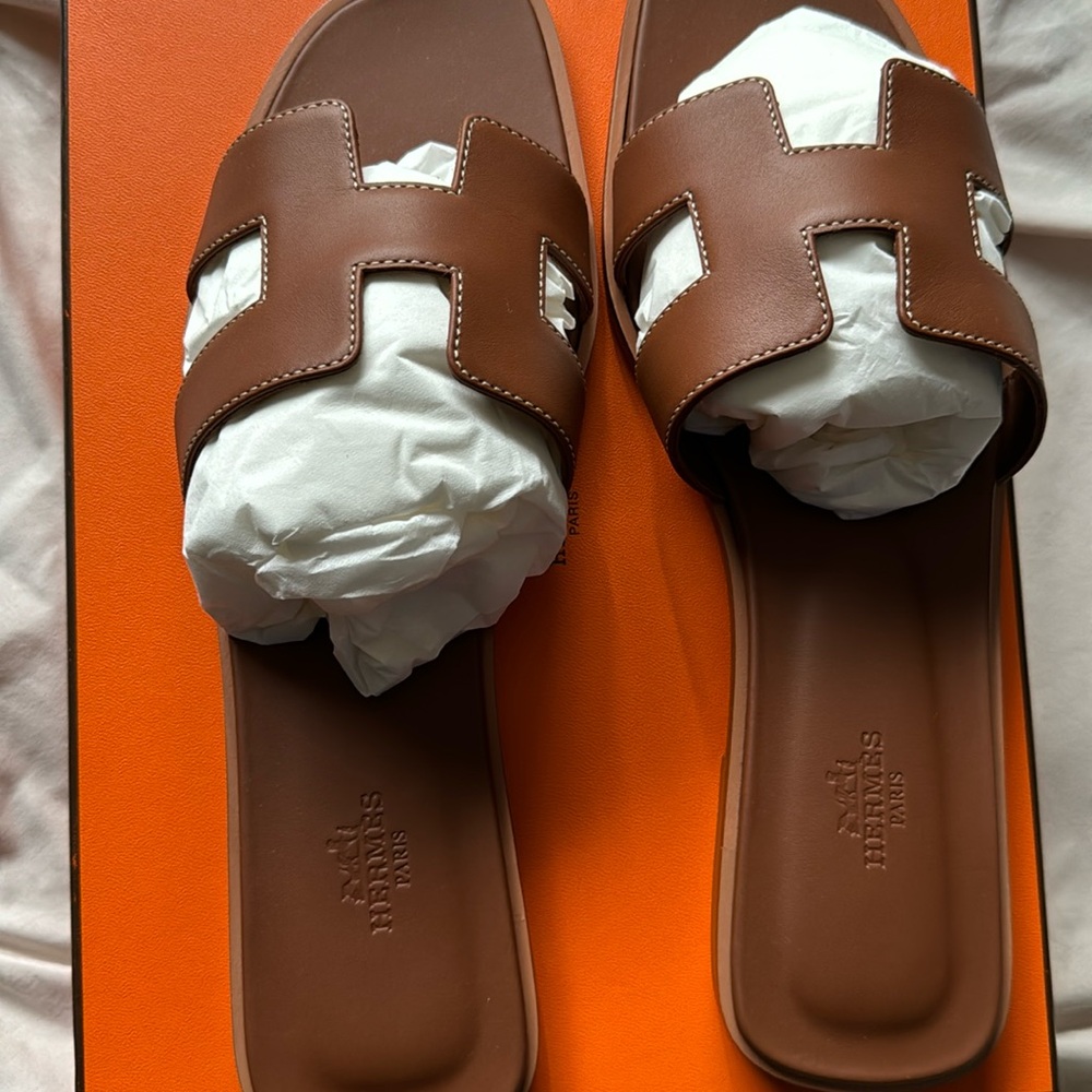 Brand new authentic brown oran sandals